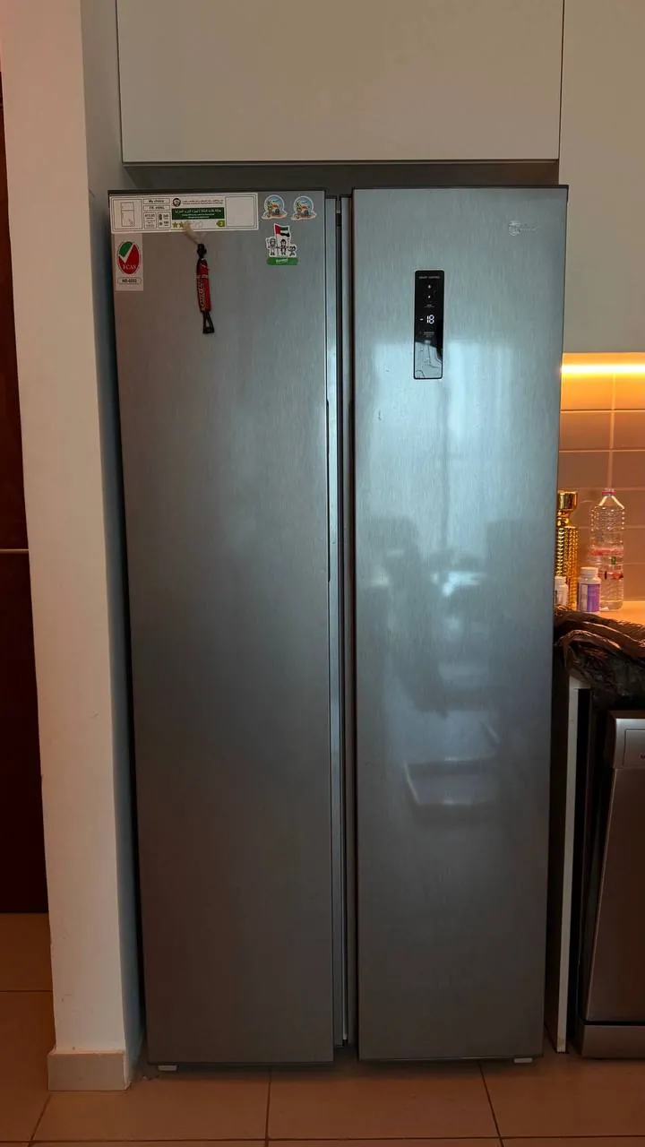 For sale: My Choice FR-450SL side-by-side fridge freezer, silver finish.