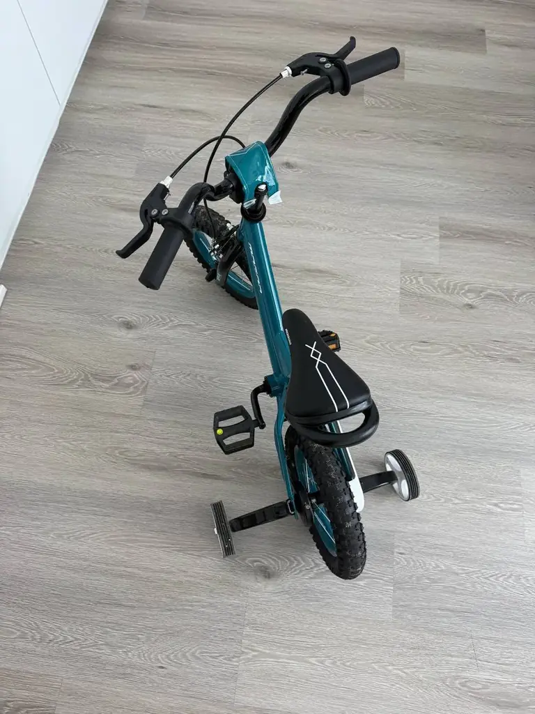Kids Bike, Mogoo 12" with Training Wheels, AED 200 (negotiable) Mogoo 12" kids bike in perfect cond…