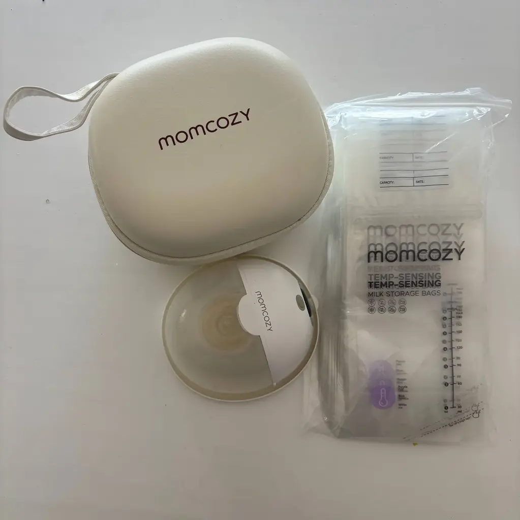 Продам автоматический молокоотсос Momcozy (70 €)