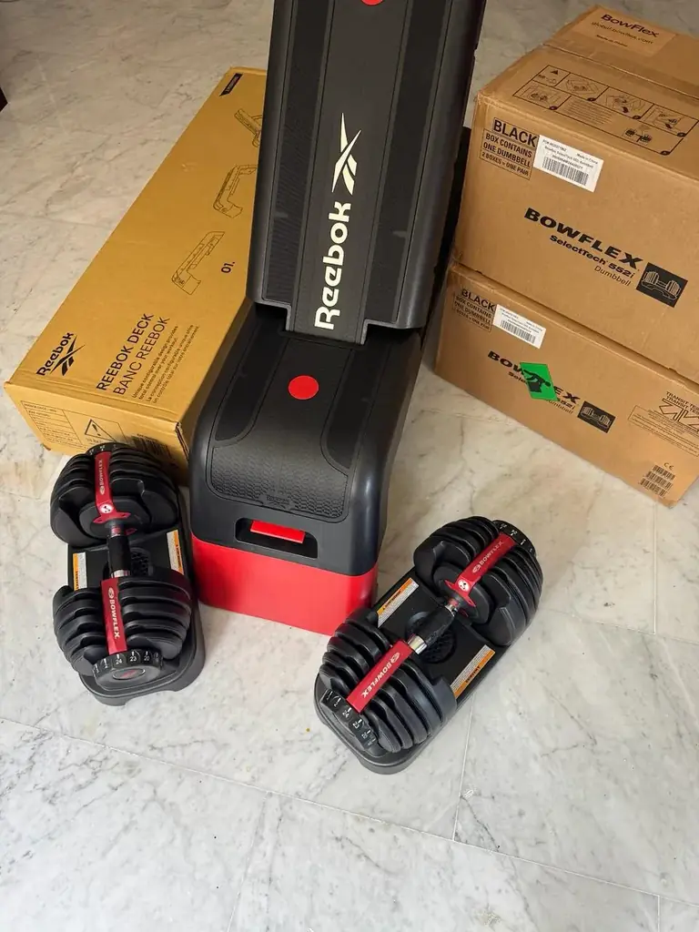 Продам пару регулируемых гантелей Bowflex SelectTech 552i (2–24 кг)