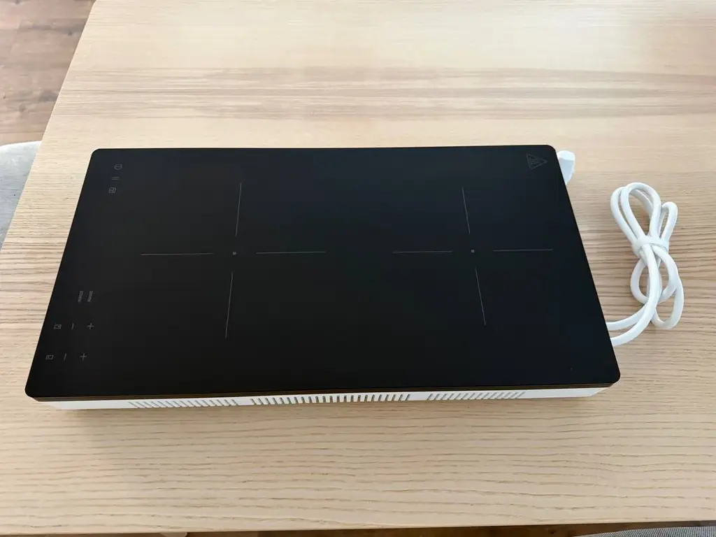 Портативная индукционная плита IKEA (https://www.ikea.com/es/en/p/tillreda-portable-induction-hob-2…