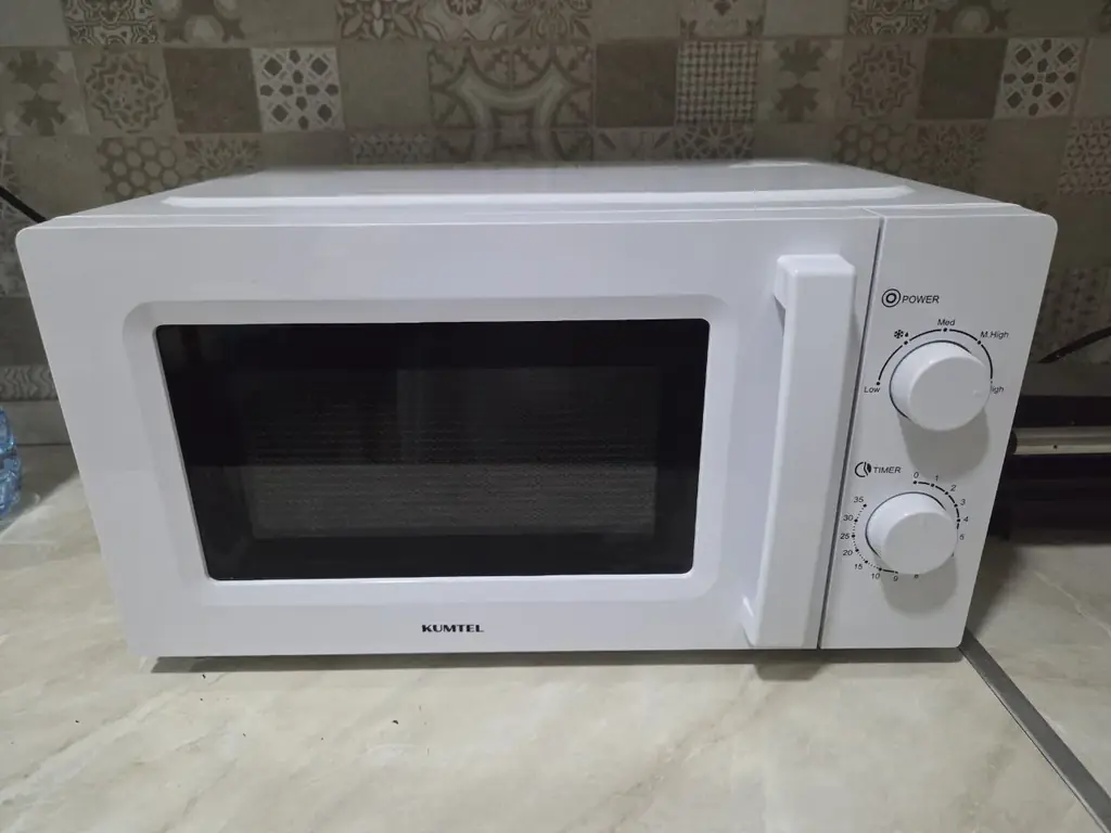 Продаю микроволновую печь KUMTEL