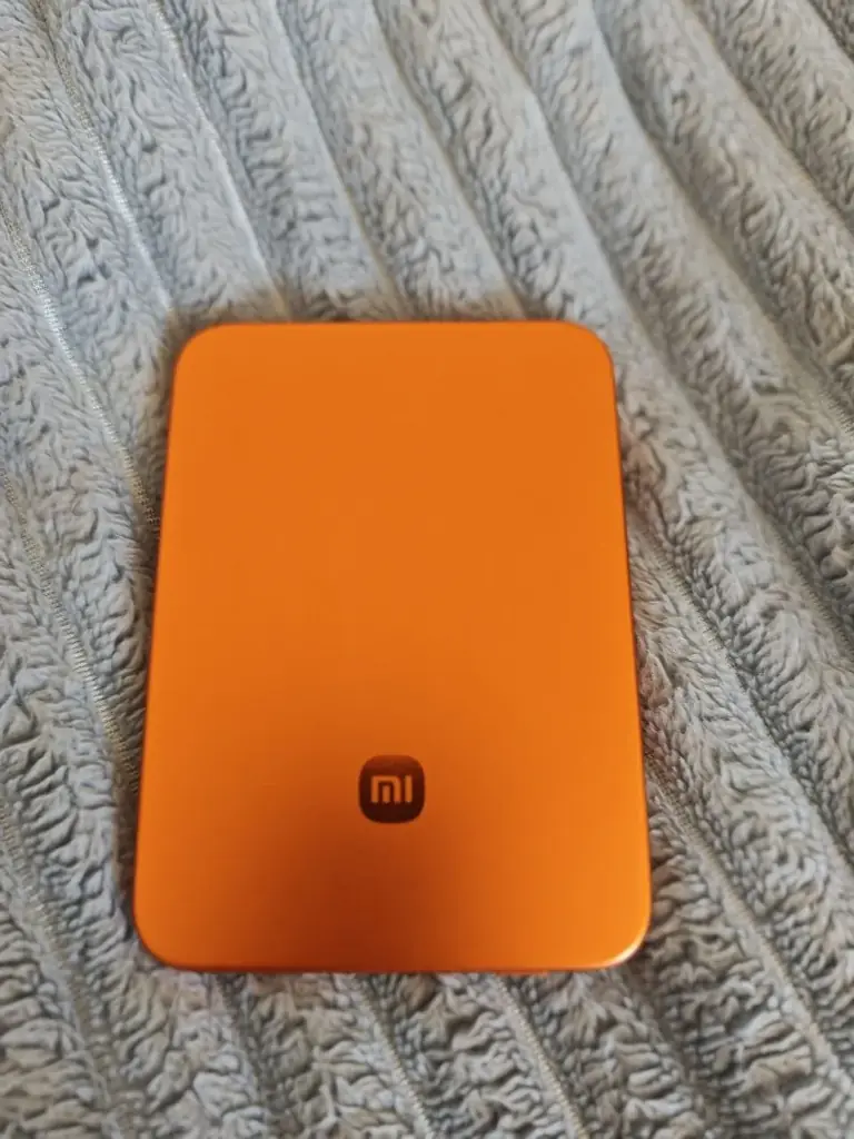 🔥 Продам оригинальный повербанк Xiaomi в оранжевом цвете (5000 mAh, 15W). Состояние — абсолютно но…