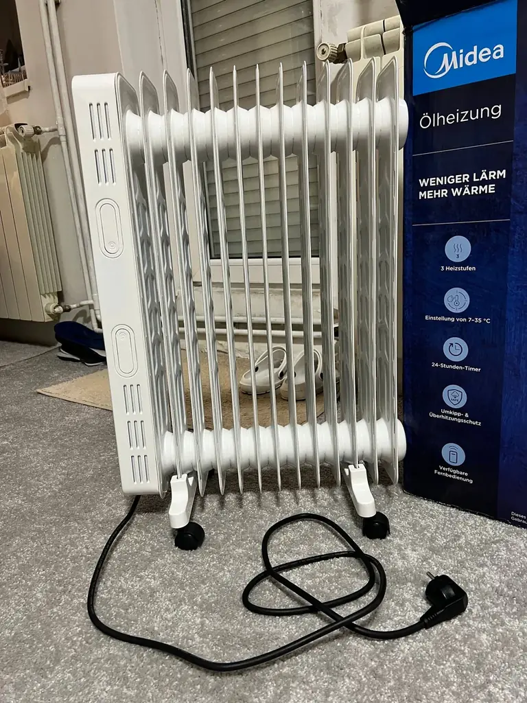 Продаю масляный обогреватель Midea модели NY2513-22MR.