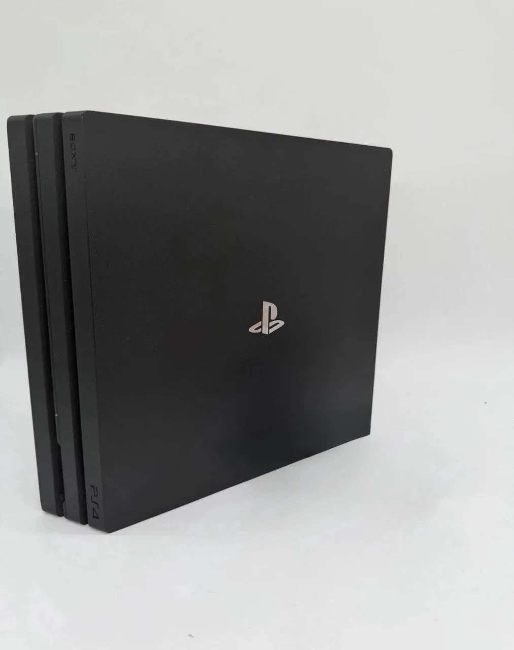 playstation 4 pro in good condition with a controller , 2 games and cables