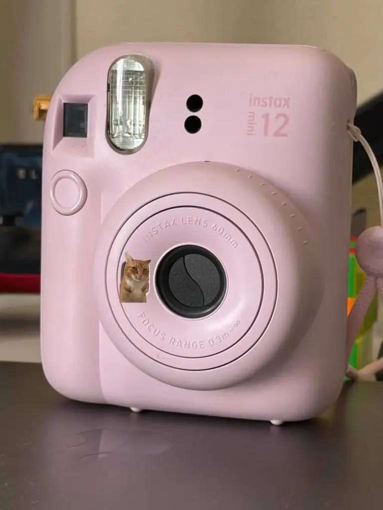 Продам instax mini 12